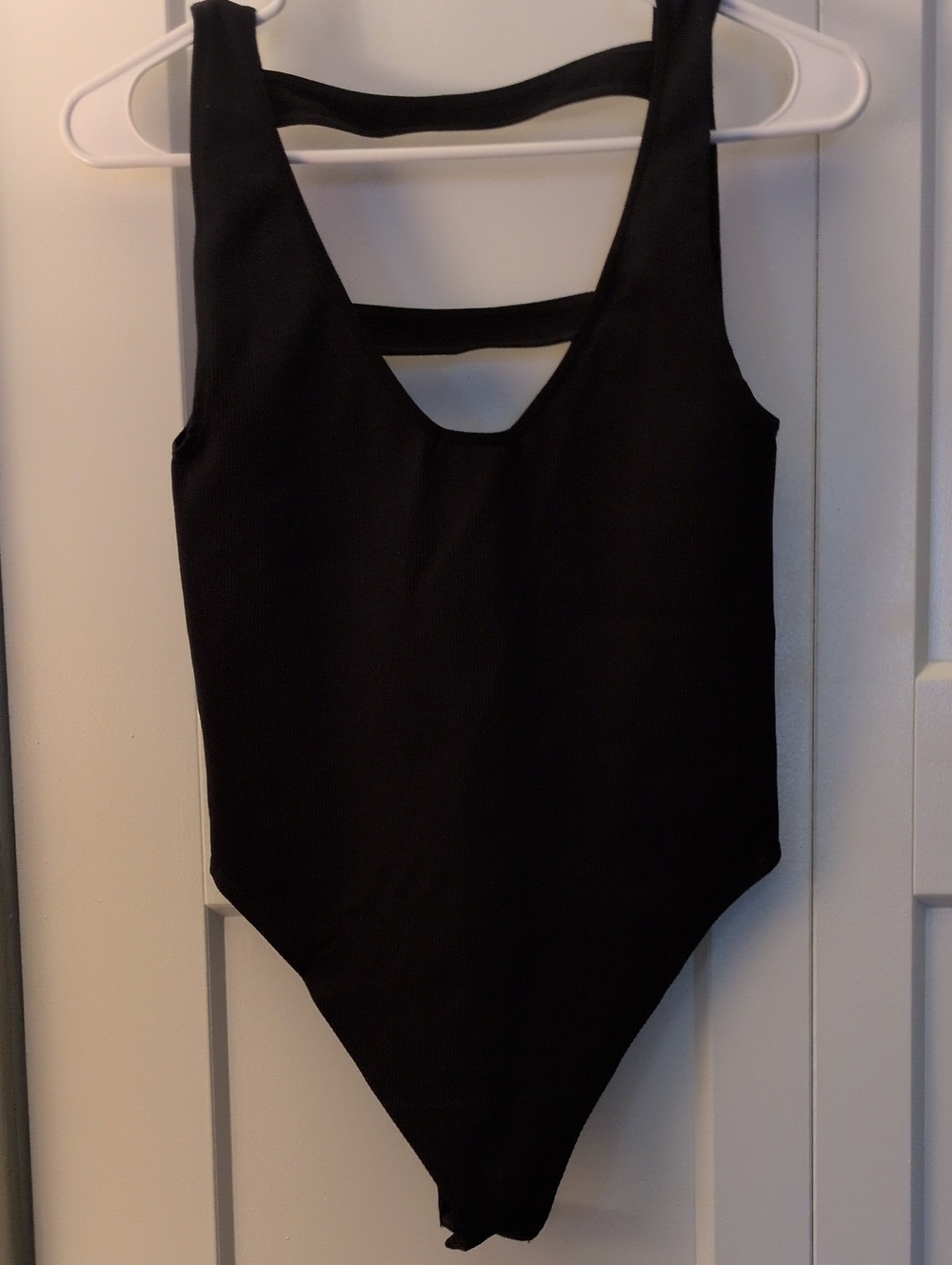 Anthropologie Black One-Piece Bodysuit with Strap Back